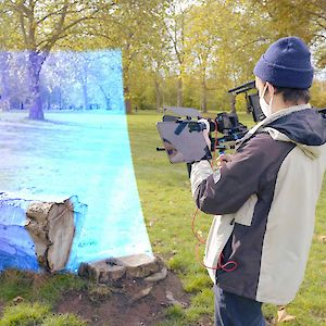 Film operator holding a lidar equipped cinema camera